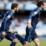 Gareth Bale celebra el gol de la victoria ante la Real Sociedad, perseguido por su compañero Nacho.