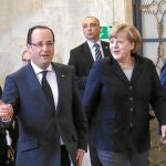 Hollande, ayer junto a la canciller alemana, Angela Merkel