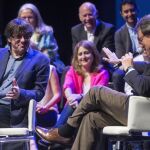 El presidente de la Generalitat, Carles Puigdemont y Artur Mas durante un acto del PDeCAT