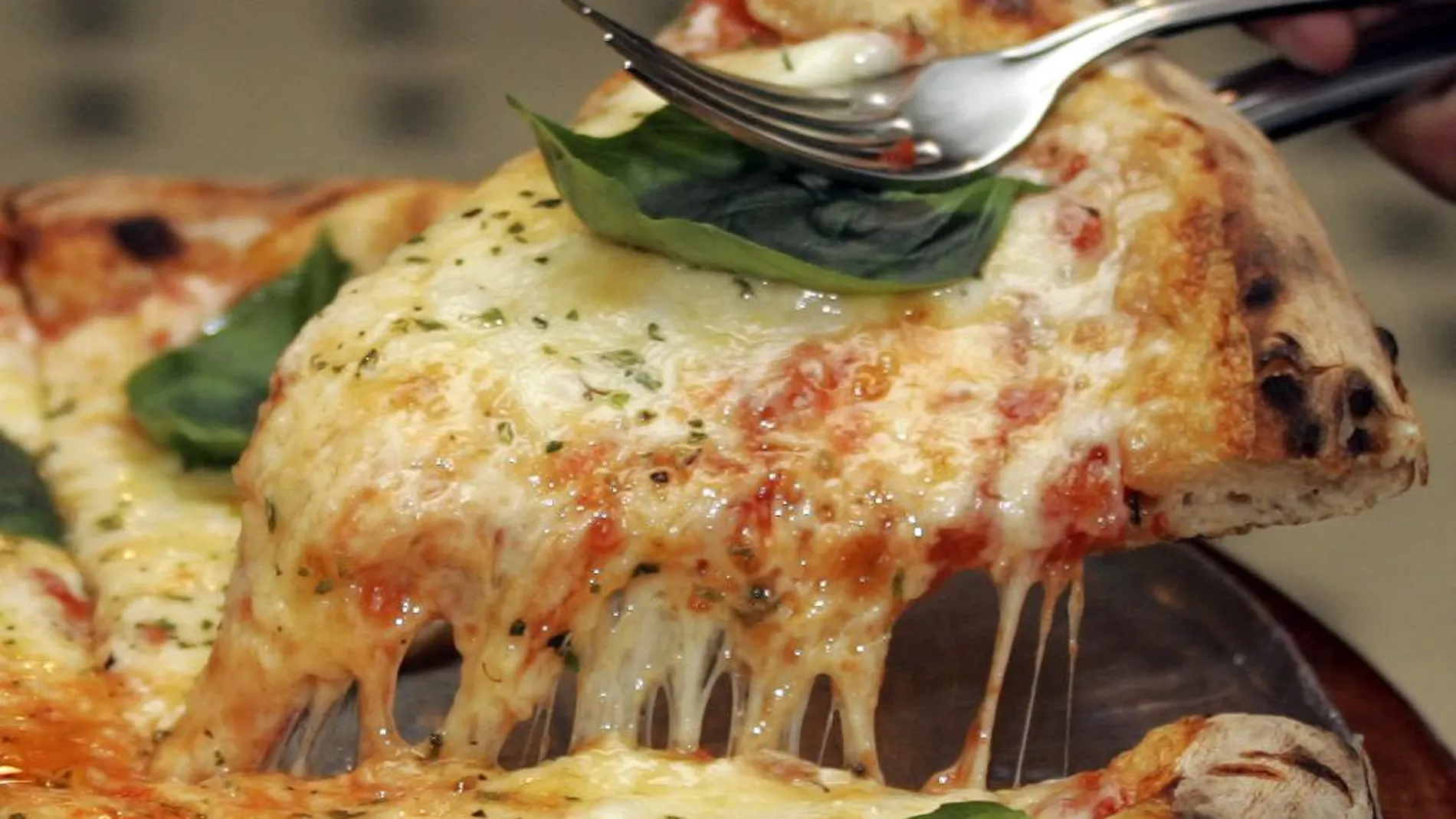 Porción de pizza por décimos no premiados