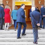 Rajoy conversa con el ministro de Exteriores, José Manuel García-Margallo, el día de la incorporación de íñigo Méndez de Vigo a la cartera de Educación