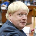British Foreign Secretary Boris Johnson looks toward the media prior to a meeting of EU foreign ministers at the EU Council building in Brussels on Monday, Nov. 14, 2016. EU foreign ministers meet Monday to discuss strained ties with Turkey and trans-Atlantic ties after the U.S.election victory of Donald Trump. (AP Photo/Virginia Mayo)