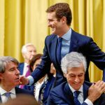 El presidente del PP, Pablo Casado, saluda al presidente de la Comunidad de Madrid, Ángel Garrido, y a Adolfo Suárez Illana