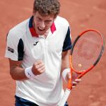 Carreño celebra un punto en el partido que le ganó a Raonic