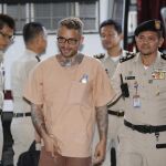 El español Artur Segarra (c) a su llegada a la Corte Criminal de Tailandia