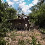 Excavadora en la finca Cuchuy