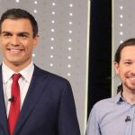 Pedro Sánchez y Pablo Iglesias sonríen ante los medios en una imagen de archivo