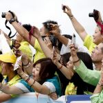 Un grupo de turistas, con sus móviles