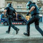 Mossos durante una intervención en una manifestación en Barcelona