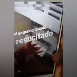 Captura del vídeo donde una mujer mata a una gato en la lavadora
