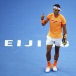 El tenista español Rafael Nadal celebra un punto ante el francés Adrian Mannarino durante el partido de octavos de final del Abierto de China de Pekín