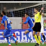 Los jugadores del Getafe celebran el gol del empate ante el Sevilla en el partido de LaLiga en el estadio Sánchez Pizjuán de Sevilla