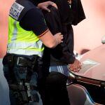 Luis José Galán, "Yusuf"es conducido por agentes de la Policía Nacional tras su detención en Madrid. EFE/Luca Piergiovanni