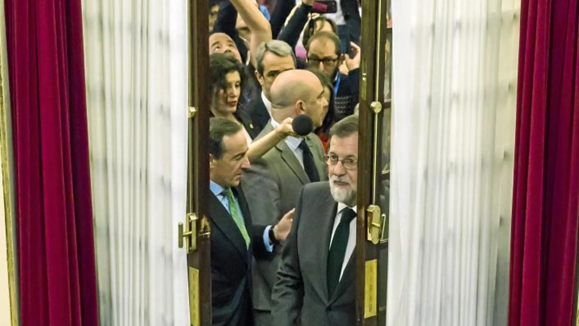 El ex presidente Mariano Rajoy entra en el hemiciclo del Congreso en la segunda jornada de la moción de censura