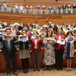Simona Palacios Antón, Silvia Clemente, Alicia García y los más de 200 participantes en el acto institucional celebrado en las Cortes, rompen, simbólicamente, las barreras que impiden su inclusión