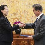 El presidente de Corea y la hermana de Kim Jong Un /Ap