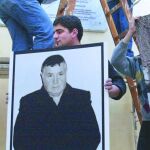 La imagen de Riina cuando fue arrestado cuelga del Museo Antimafia en Sicilia