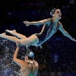 El equipo de España ejecuta su ejercicio en la final de rutina libre combinada de los Campeonatos del Mundo de Natación que se han celebrado hoy en la piscina del Palau Sant Jordi de Barcelona.