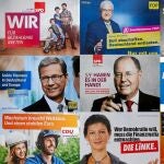 A la derecha, carteles electorales de los partidos que se enfrentan en las elecciones del 22 de septiembre
