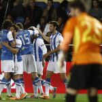 Los jugadores de la Real Sociedad celebran su primer gol ante el Villarreal