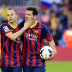 Andrés Iniesta y su compañero, el delantero argentino del FC Barcelona Lionel Messi.