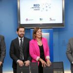 Jesús Fuertes, Eduardo Álvarez, Milagros Marcos y Alejandro Salgado, durante la firma del convenio