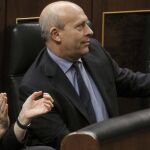 José Ignacio Wert recibe los aplausos de sus homólogos de Industria, José Manuel Soria, Empleo, Fátima Báñez y Fomento, Ana Pastor, durante el pleno del Congreso que ha aprobado definitivamente la Lomce.