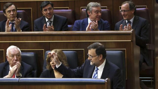 El presidente del Gobierno, Mariano Rajoy, durante el pleno del Congreso que aprobará la ley orgánica por la que se hace efectiva la abdicación del Rey