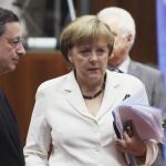 Mario Draghi y Angela Merkel
