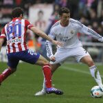 Cristiano Ronaldo intenta marcharse de Juanfran Torres en un derbi