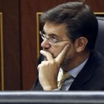 El ministro de Justicia, Rafael Catalá, durante el pleno del Congreso de los Diputados en el que se ha aprobado la reforma del Código Penal que introduce la prisión permanente revisable