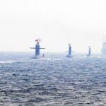 Submarinos y buques de guerra chinos en un desfile naval
