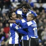 El delantero francés del Hércules Olivier Thomert (c), celebra con sus compañeros David Trezeguet (d), el colombiano Abel Aguilar (i) y el paraguayo Nelson Valdez, el gol que ha marcado al Atlético de Madrid