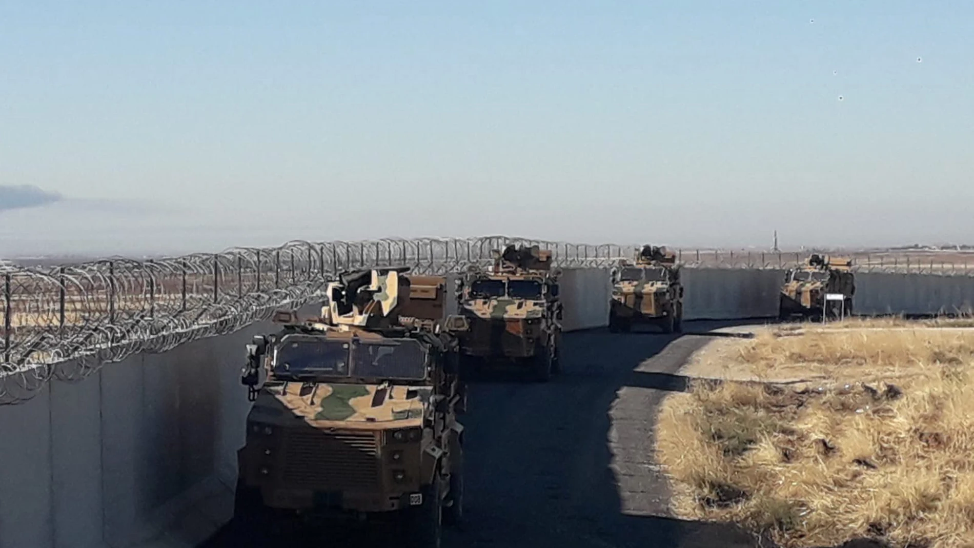 Turkish and Russian troops conduct joint ground patrols in northeast Syria