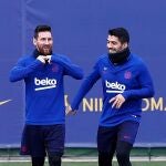 Messi, con Luis Suárez