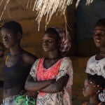 ORANGO ISLAND, GUINEA BISSAU - MAY 3, 2017: Unidentified local people stand in the Etigoca village. People in G.