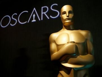 FILE - In this Feb. 4, 2019 file photo, an Oscar statue appears at the 91st Academy Awards Nominees Luncheon in Beverly Hills, Calif. The Oscars will not have a host for its annual awards show. (Photo by Danny Moloshok/Invision/AP, File)