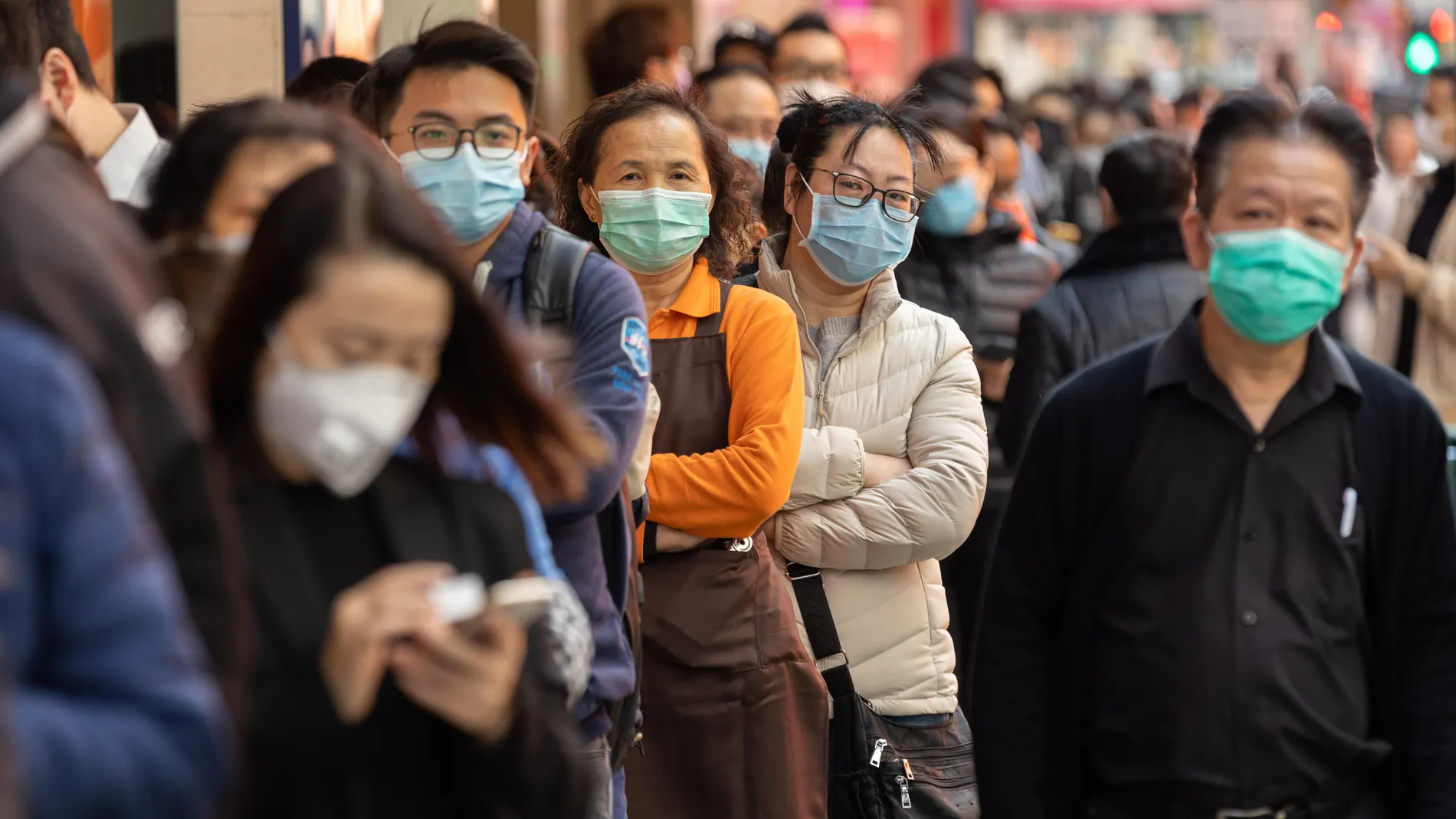 Long queues outside pharmacies as coronavirus fear spreads in Hong Kong