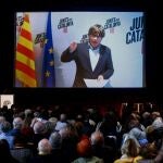 GRAF6904. BARCELONA, 08/02/2020.- El expresidente de la Generalitat, Carles Puigdemont interviene por videoconferencia en un acto político de JxCat en El Born Centre de Cultura i Memòria de Barcelona este sábado bajo el lema "A punto". EFE/Quique García