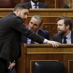GRAF8593. MADRID, 11/02/2020.- (izda a dcha) Los diputados de Vox Santiago Abascal, Javier Ortega Smith e Iván Espinosa de los Monteros durante el pleno del Congreso de los Diputados en el que se comienza a tramitar la regulación de la eutanasia, este martes en Madrid. EFE/Chema Moya