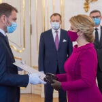 21 March 2020, Slovakia, Bratislava: Slovak President Zuzana Caputova appoints new Prime Minister of the Slovak Republic Igor Matovie (L) at the Presidential Palace, after the signing of the government coalition agreement. Photo: Michal Svítok/TASR/dpa21/03/2020 ONLY FOR USE IN SPAIN