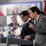 El vicepresidente segundo, Pablo Iglesias, junto al ministro de Sanidad, Salvador Illa, en una comparecencia por la crisis del coronavirus