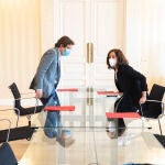 La presidenta de la Comunidad de Madrid, Isabel Díaz Ayuso, con el alcalde de la capital, José Luis Martínez-Almeida, ayer en Madrid