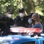 Military police gather at the official residence of Rio de Janeiro Gov. Wilson Witzel in Rio de Janeiro, Brazil, Tuesday, May 26, 2020. Brazil's Federal Police raided the governor's official residence on Tuesday to carry out searches, part of an investigation into the embezzlement of public resources in the state's response to the COVID-19 pandemic. (AP Photo/Silvia Izquierdo)