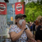Trabajadores de Nissan cortan la Gran Vía de L’Hospital (Barcelona), cerca del concesionario de Nissan Motor Llansà