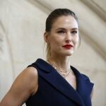 FILE - In this Feb. 26, 2019 file photo, Israeli top model Bar Refaeli poses for photographers at the Dior ready to wear Fall-Winter 2019-2020 collection, in Paris. Refaeli has signed a plea bargain agreement with authorities to settle a long-standing tax evasion case against her and her family. The deal will require Refaeli to serve nine months of community service while her mother will be sent to prison for 16 months. The two are also ordered to pay a $1.5 million fine on top of millions of back taxes owed to the state. (AP Photo/Thibault Camus, File)