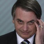 FILE - In this April 9, 2019 file photo, Brazil's President Jair Bolsonaro speaks during a swearing-in ceremony at the Planalto Presidential Palace, in Brasilia, Brazil. Bolsonaroâ€™s latest education minister offered his resignation Tuesday, June 30, 2020, just days after his appointment, creating a new headache for the embattled leader as he struggles to start a new chapter at the ministry and shore up flagging support. (AP Photo/Eraldo Peres, File)