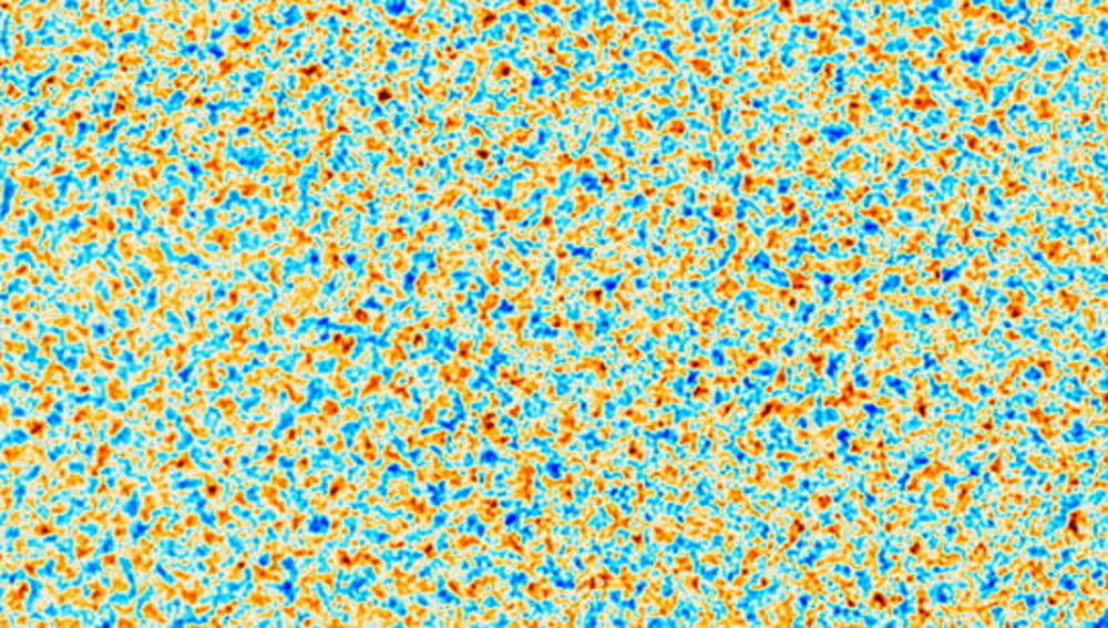 Una porción de una nueva imagen de la luz más antigua del universo tomada por el ACT. Esta parte cubre una sección del cielo 50 veces el ancho de la luna, que representa una región del espacio de 20 mil millones de años luz de diámetro. La luz, emitida 380,000 años después del Big Bang, varía en polarización (representada por colores más rojos o azules). Los astrofísicos utilizaron el espacio entre estas variaciones para calcular una nueva estimación de la edad del universo.