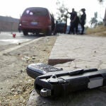 Escena de un crimen cometido por sicarios en México en una foto de archivo