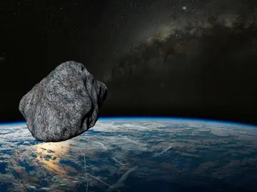 Recreación de un meteorito cayendo a la tierra Recreación de un meteorito cayendo a la tierra